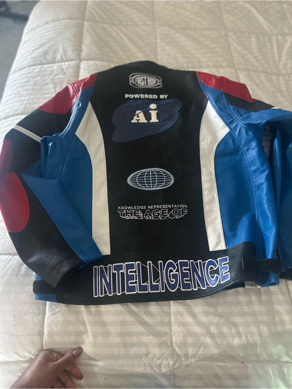 First Row Black, Blue & Red Graphic Bomber Jacket